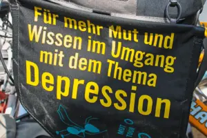 Aufschrift: Für mehr Mut und Wissen im Umgang mit dem Thema Depression